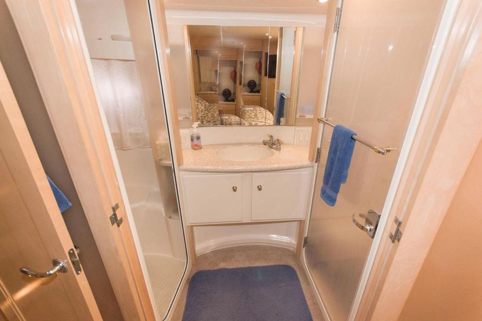 Master Stateroom sink. Shower on left (forward) and Toilet on right (aft). 