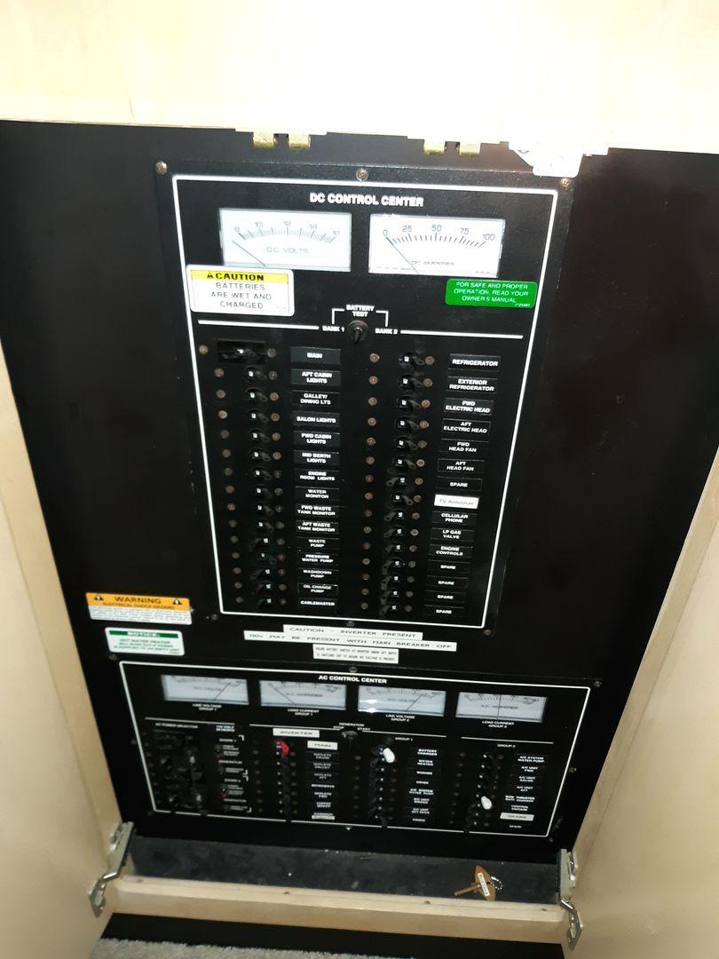 Electrical panel. 13.5KW Kohler Generator and 3000amp Mangnum Inverter. Two battery chargers. One for house banks and one for thrusters and Freedom Lift. 