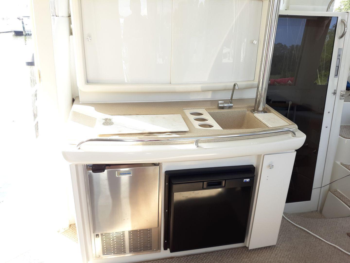 Mini Bar in the lower bridge lounge area (Lido Deck) with mini-fridge, sink and icemaker. 