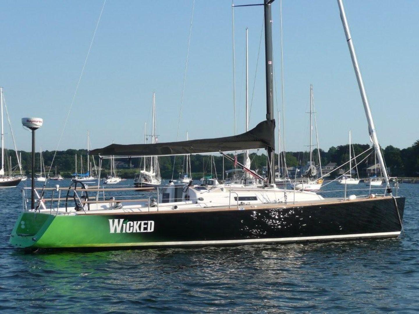 The original owners called the boat "Wicked", obviously named after the musical. They currently have a J/111 with the name "Wicked 2.0". 
