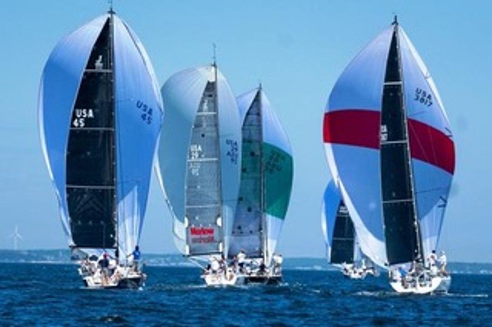 About 60-70% of the time we are day sailing, 20% cruising, and about 10-15% of the time racing- seen here (green) at the Ted Hood Regatta in 2020.
